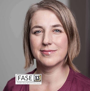 Portrait of interior architect Sylvia Fase with the FASE13 logo