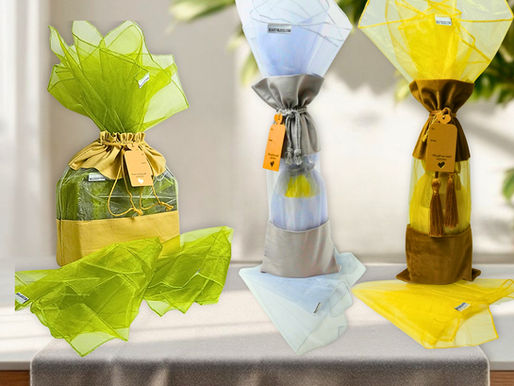 Beauty Blisss reusable wine gift bags with organza wrap fillers, gift tags, and polished eco-friendly gift presentation.