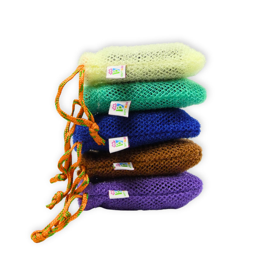 Five African net soap saver bags stacked together in assorted earth-tone colors with drawstring cords