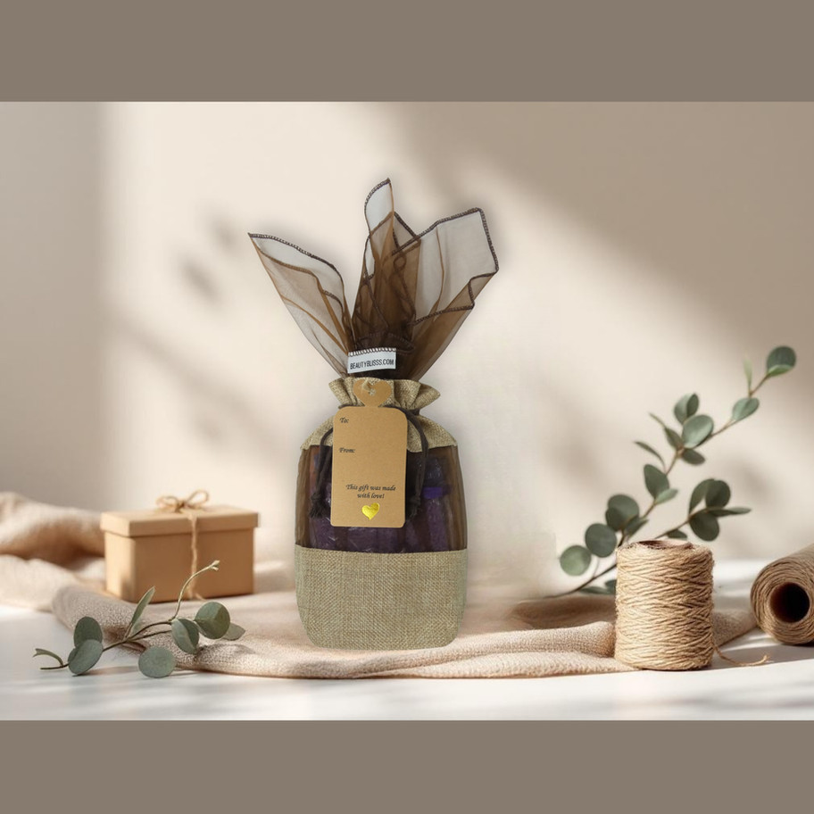 Kraft heart-top tag tied to a reusable fabric gift bag, jute & snap-lock fastener for an elegant eco-friendly presentation.