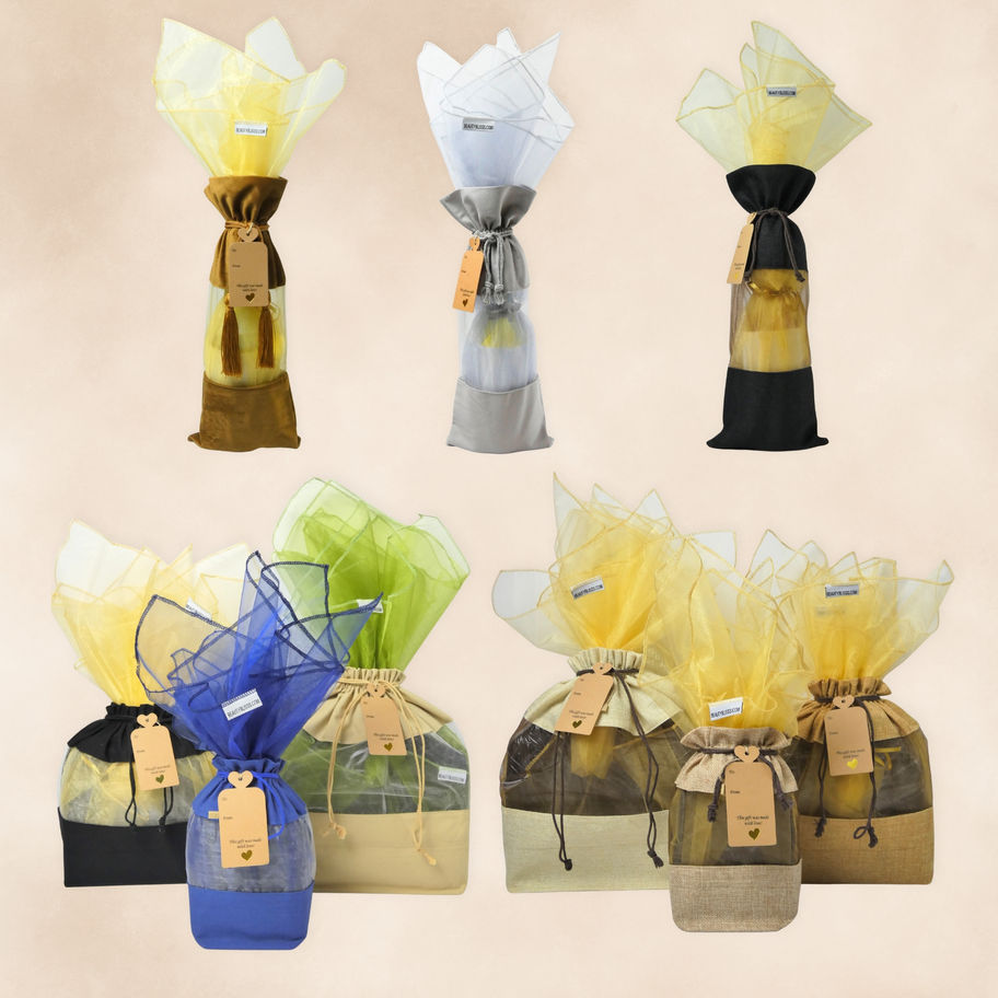 Kraft gift tag attached to a reusable gift bag and wine bag for a polished gift-ready presentation