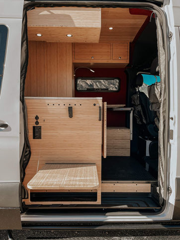 van life kitchen
van door fold down table