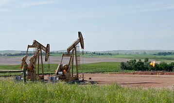 Bernice_1_and_2_wells_with_moisture_flare_-_Arnegard_North_Dakota_-_2013-07-04.jpeg