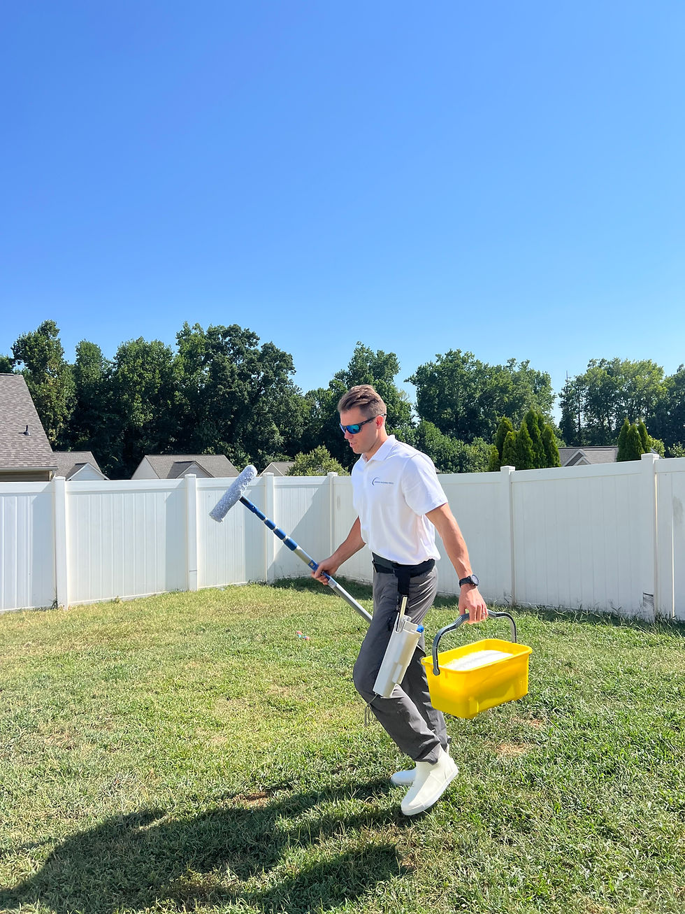 Clean residential windows reflecting fall leaves near Lake Norman