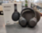 Sony WH-1000XM4 black wireless noise cancelling headphones with original box, carry case, cables, adapter, and paperwork