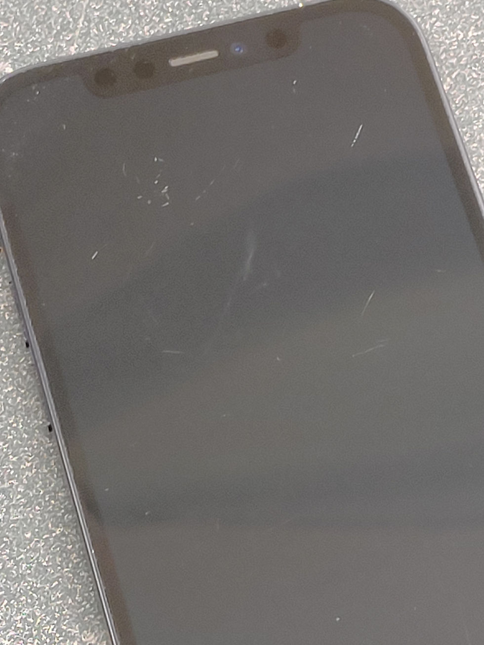 Thumbnail: Black Apple iPhone 12 64GB shown powered on with home screen, lock screen, settings, battery health, rear glass, camera area