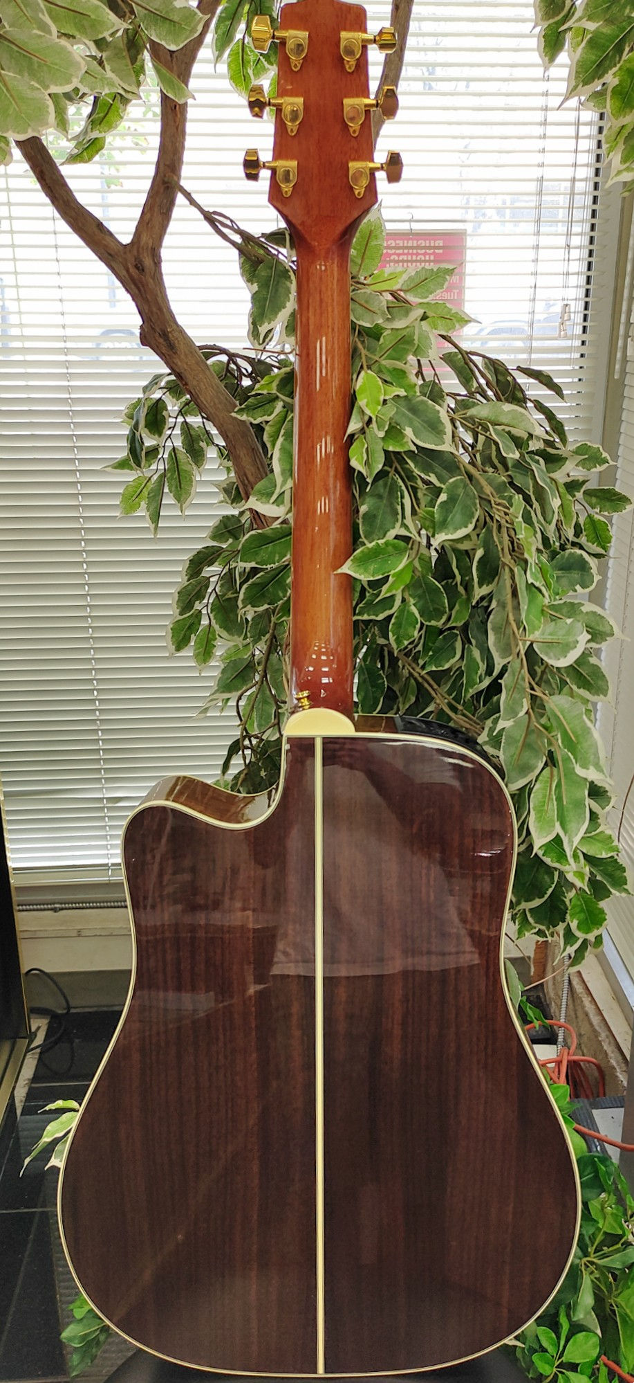 Takamine GD51CE‑NAT dreadnought acoustic-electric guitar in natural gloss.
