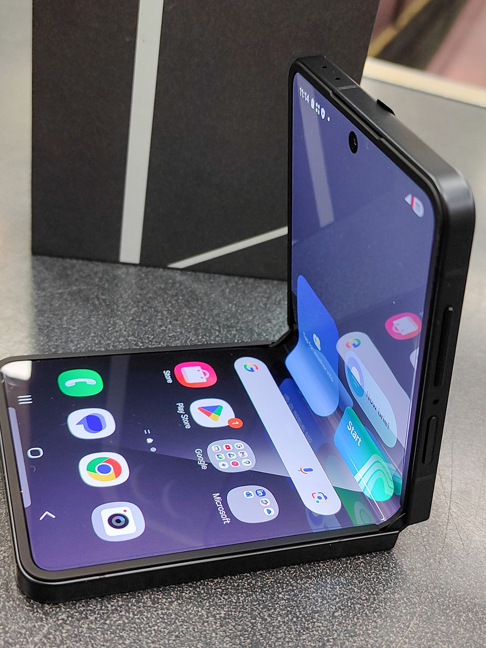 Thumbnail: Open box Samsung Galaxy Z Flip7 256GB in Jet Black shown with original box, unfolded display, outer cover screen, rear camera