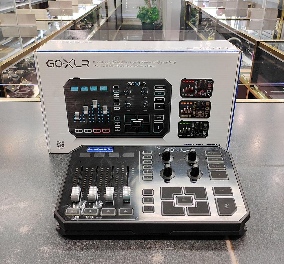 Mint-condition TC-Helicon GoXLR console with box, packaging, power adapter, and protective film still on unit.