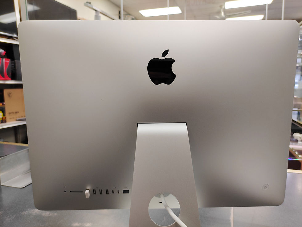 Thumbnail: 2017 21.5-inch silver Apple iMac on a counter, powered on with macOS Ventura desktop, shown with white wireless keyboard and