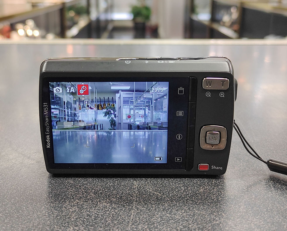 Thumbnail: Gray Kodak EasyShare M531 camera with battery, charger, 8GB SD card and strap