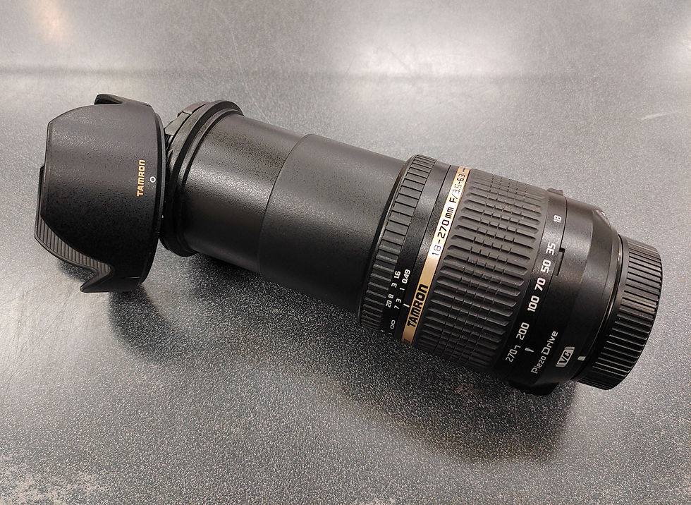 Thumbnail: Tamron 18-270mm f/3.5-6.3 Di II VC PZD Nikon F-mount lens with hood and caps