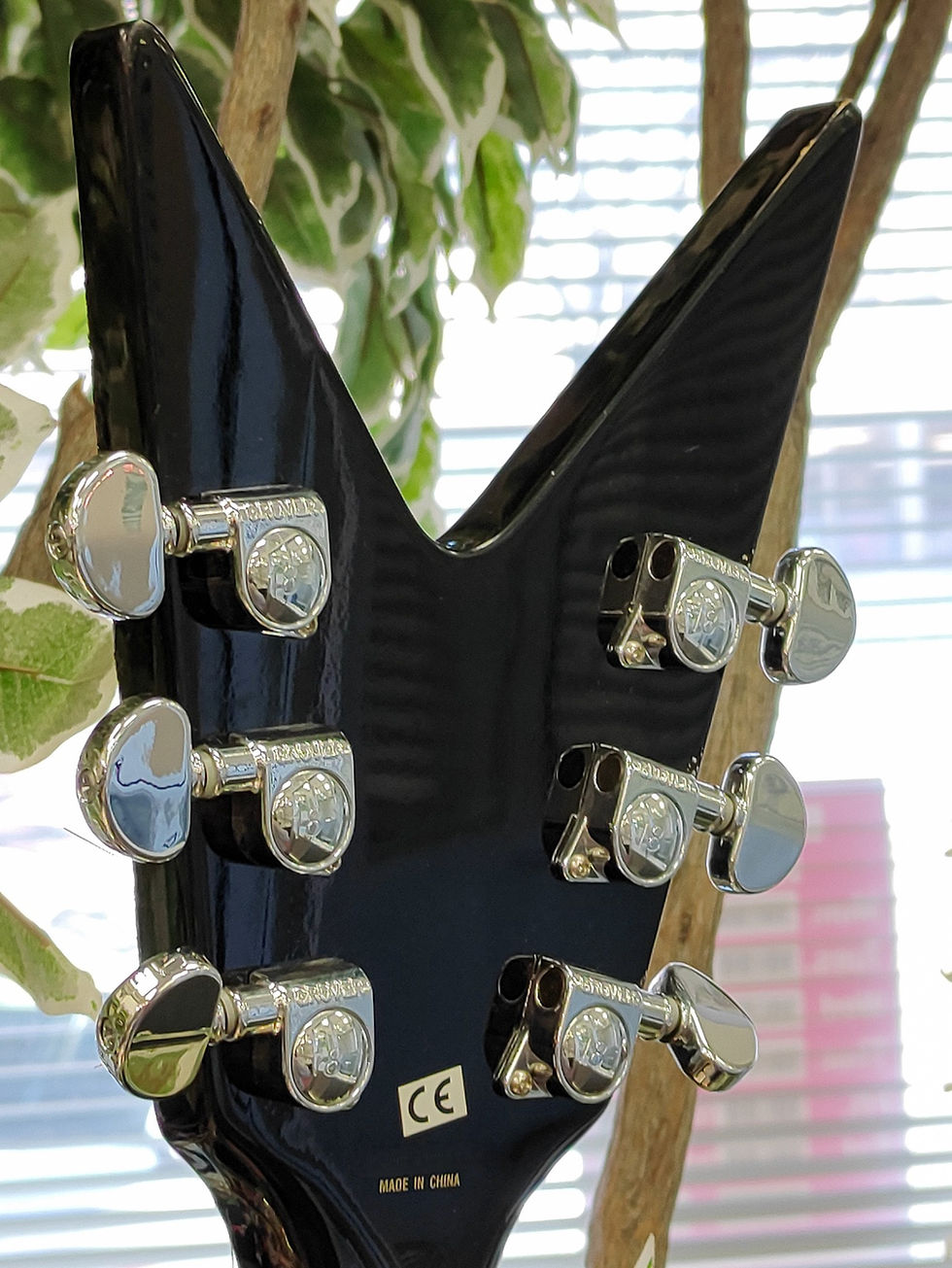 Thumbnail: Washburn Dimebag Darrell signature Dime V electric guitar in green camo finish with dual humbuckers and string-through V plat