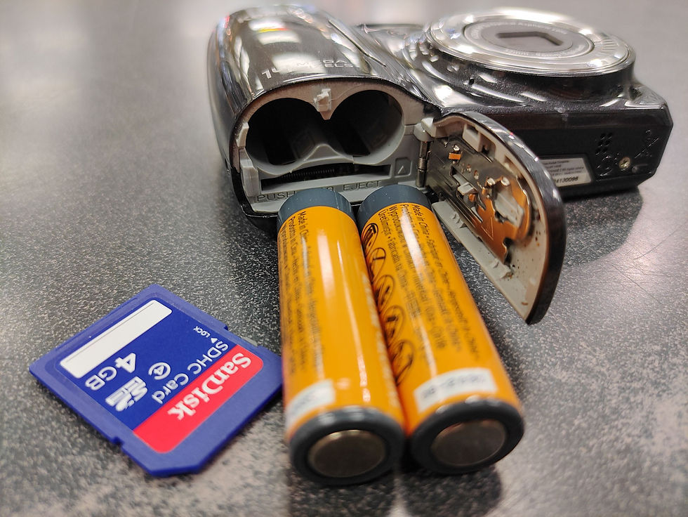 Thumbnail: Black Kodak EasyShare C183 14MP digital camera with two AA batteries and 4GB SDHC card