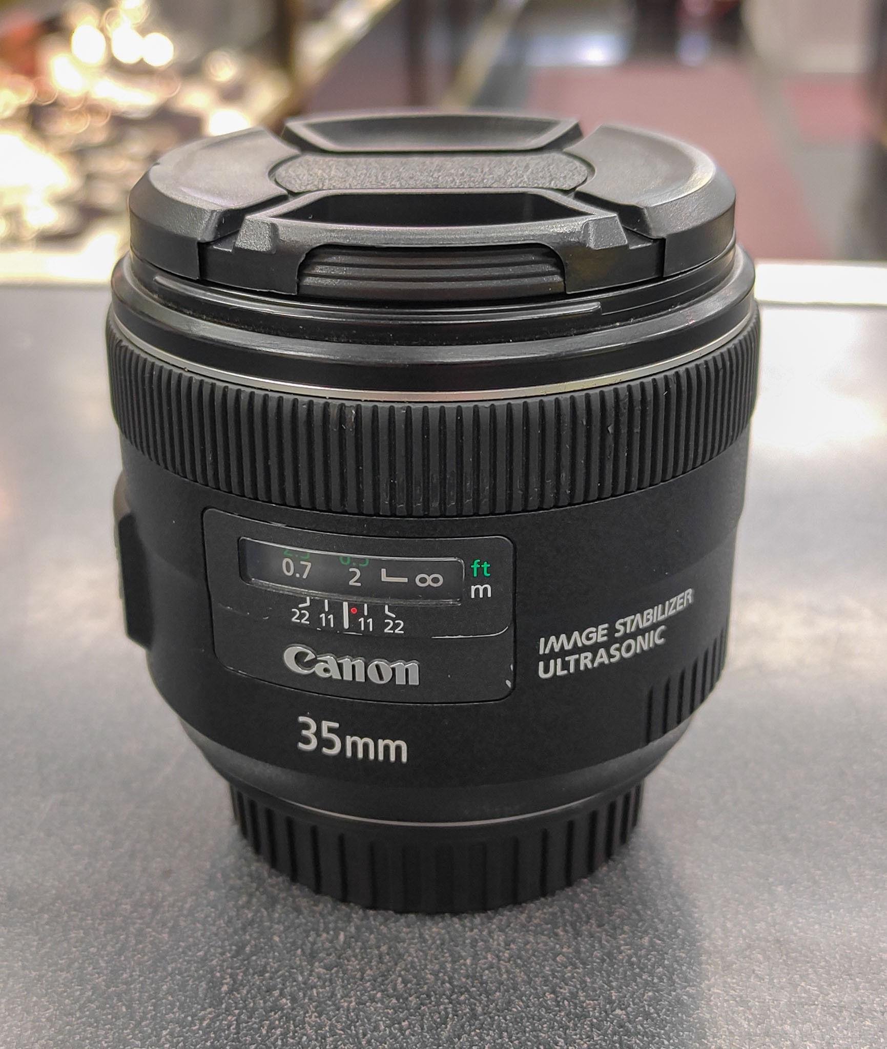 Canon EF 35mm f/2 IS USM prime lens in excellent condition with front and rear caps
