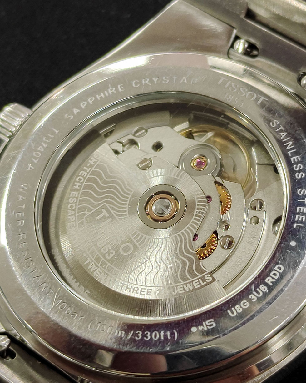 Thumbnail: Tissot PRX Powermatic 80 automatic watch with white dial, rose-gold PVD bezel and stainless-steel bracelet