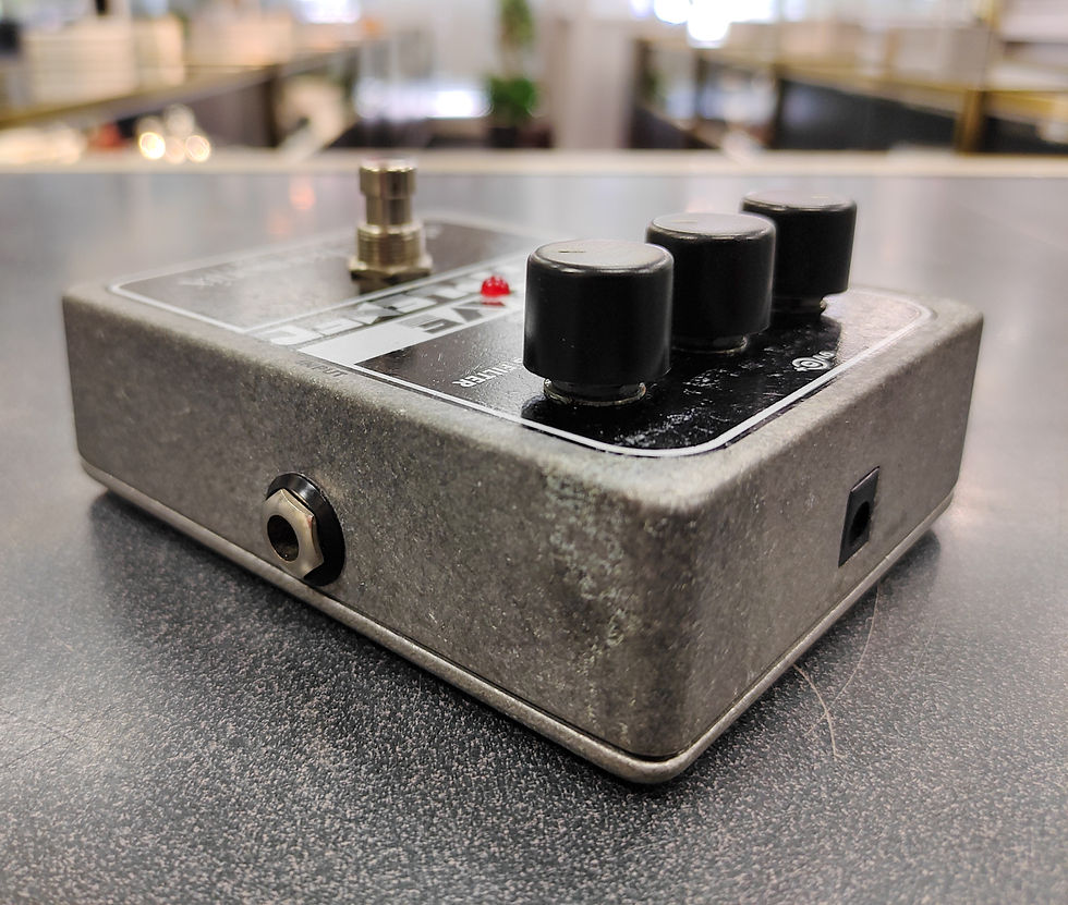 Thumbnail: Electro-Harmonix Octave Multiplexer big-box analog sub-octave pedal with visible used wear and bottom Velcro pad