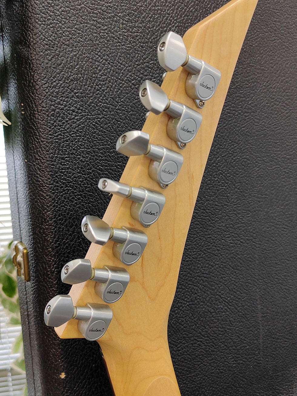 Thumbnail: Metallic purple Jackson RR7R seven-string Rhoads guitar with reverse headstock, hard shell case, strap, new strings, and pick