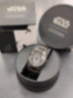 Citizen Star Wars Mandalorian Eco-Drive watch AW2045-57W showing black ion-plated bracelet, Mudhorn signet dial design