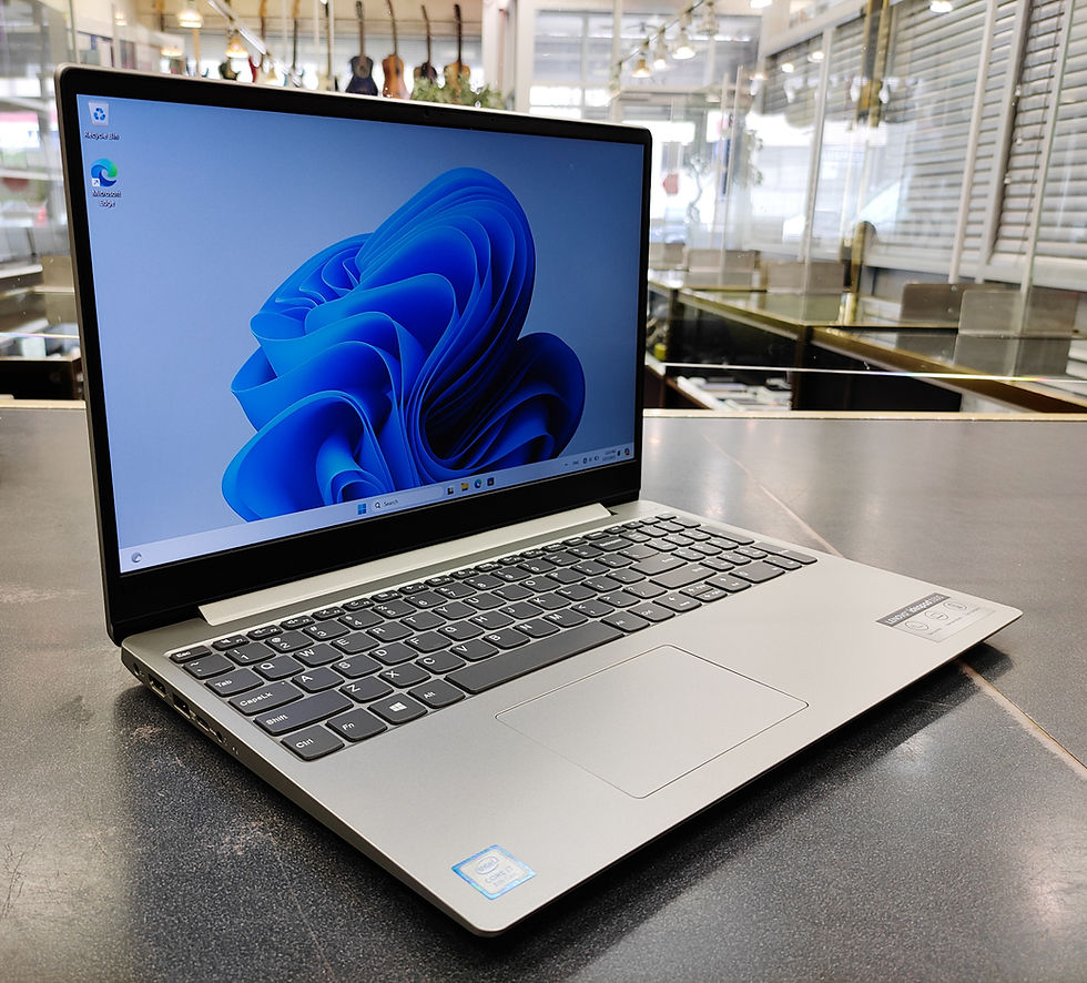 Lenovo IdeaPad 330S-15IKB in silver with 15.6" FHD display, Intel Core i7, 8GB RAM, and 256GB SSD, shown with original charge
