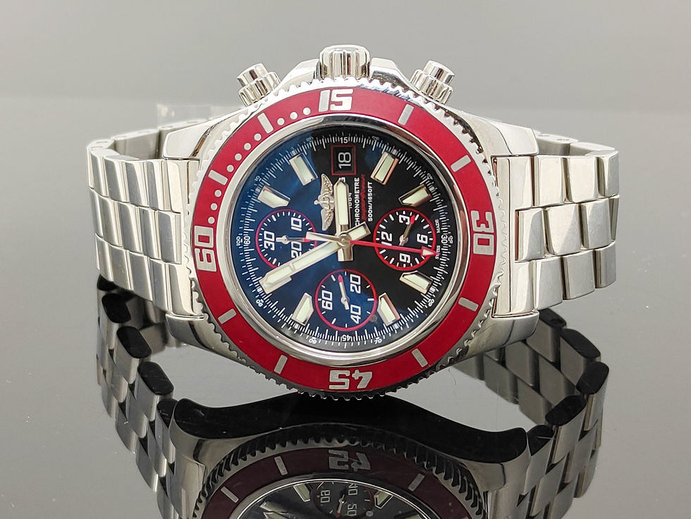 Thumbnail: Brand new Breitling Superocean Chronograph II with red bezel, black Abyss dial, and stainless steel bracelet, limited edition