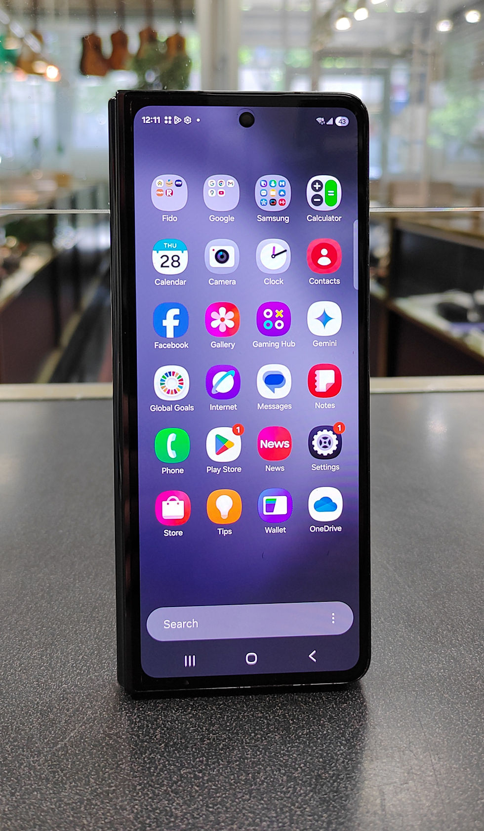 Thumbnail: Samsung Galaxy Z Fold5 256GB Phantom Black foldable smartphone shown open, folded, and from the rear with triple camera syste