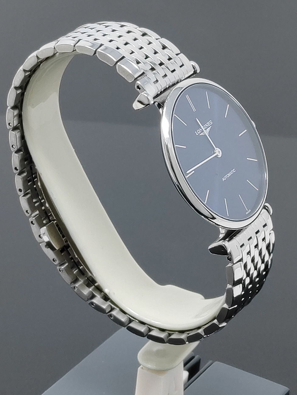 Thumbnail: Longines automatic 36mm stainless steel dress watch with sunburst blue dial and bracelet, shown from front and side profiles