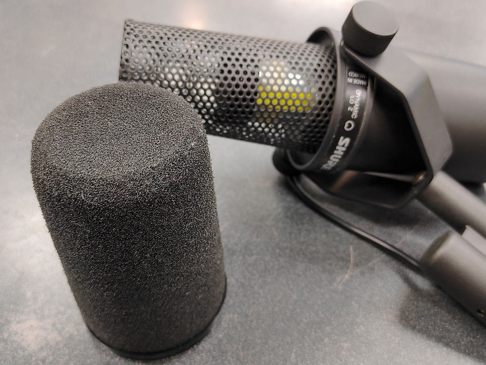 Thumbnail: Shure SM7B XLR dynamic microphone with yoke mount, foam windscreen, rear controls, and XLR connector.