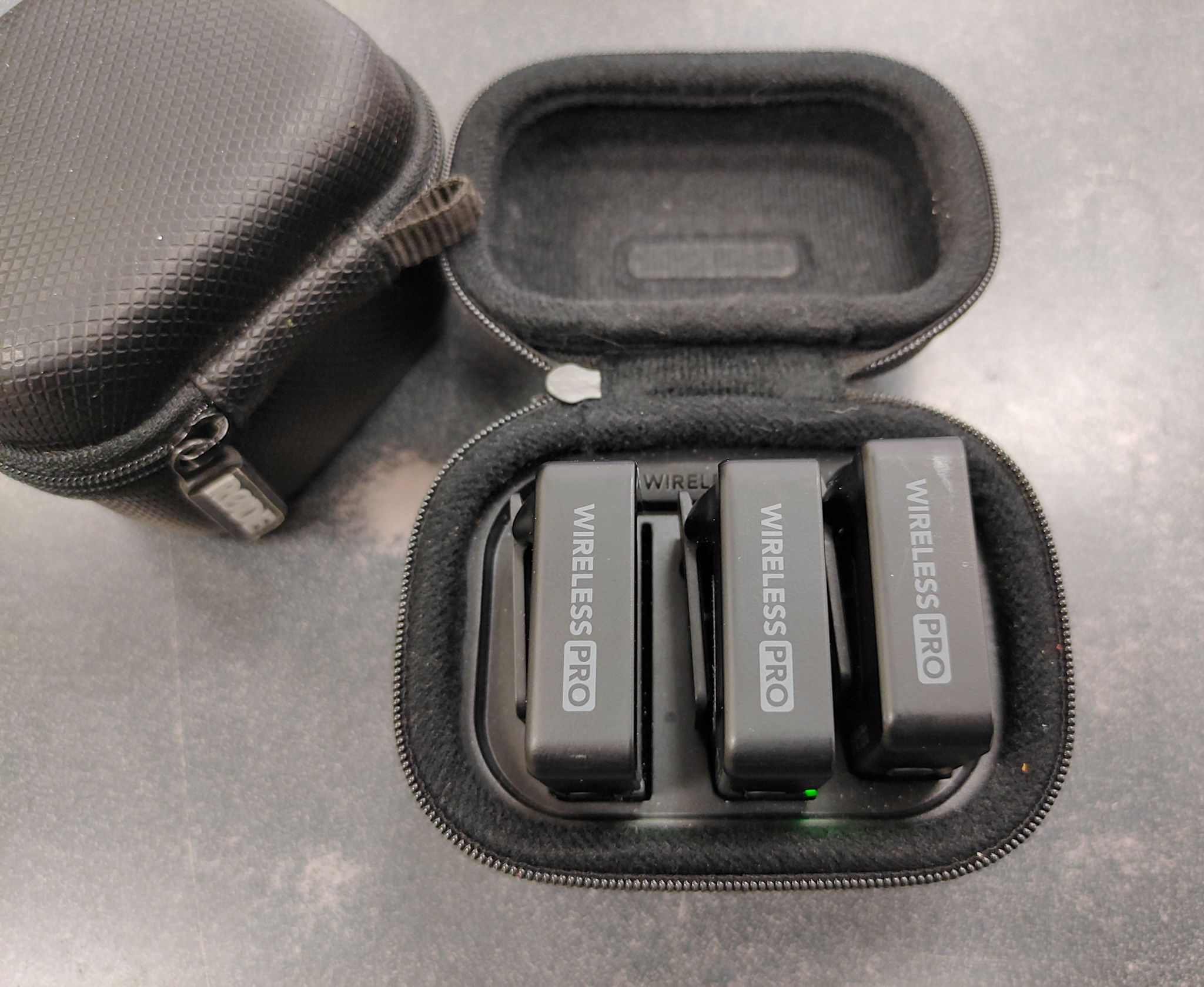RØDE Wireless PRO dual wireless microphone kit with two transmitters, receiver, smart charging case, lavalier microphones