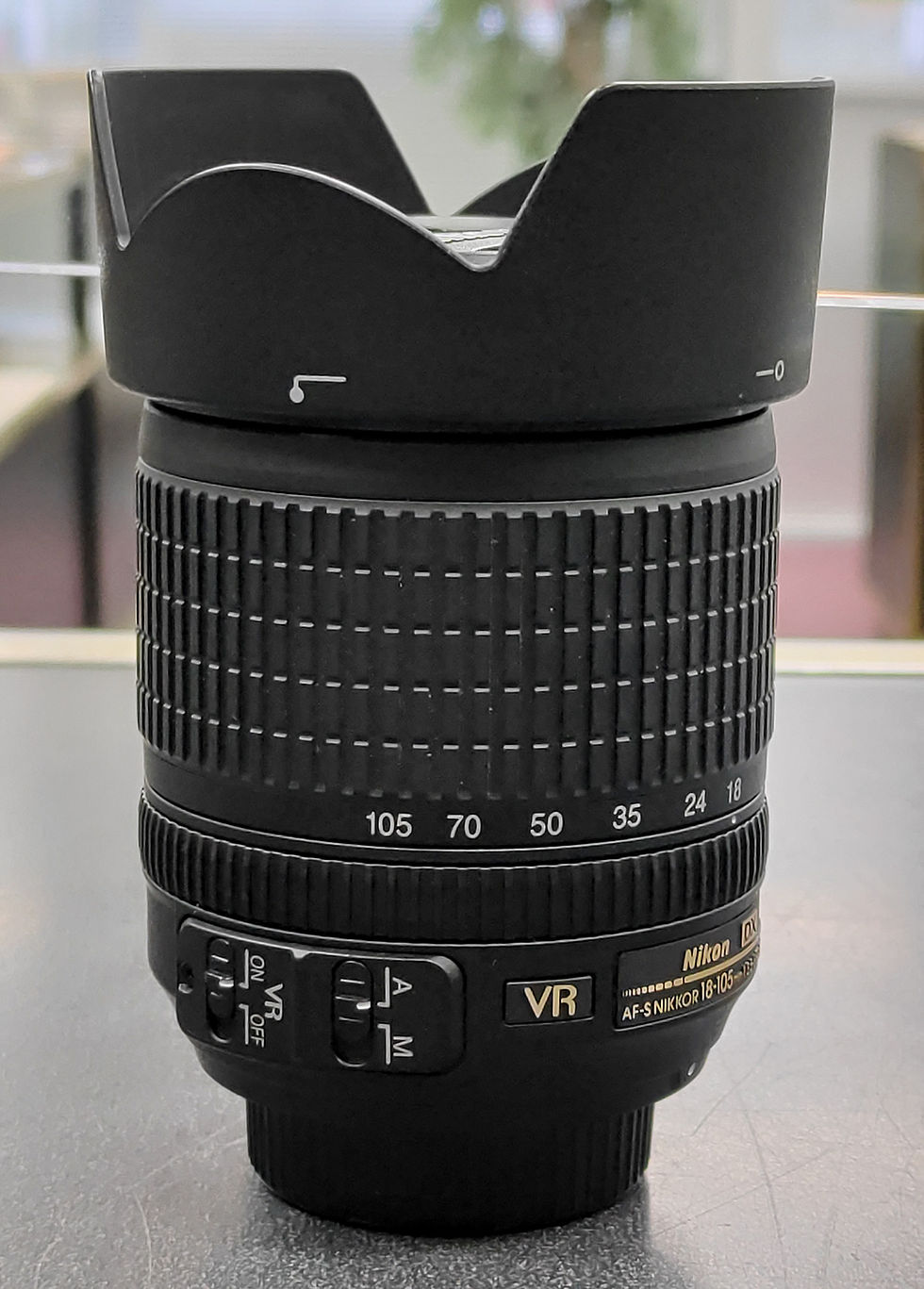 Thumbnail: Nikon AF-S DX NIKKOR 18-105mm f/3.5-5.6G ED VR Lens in excellent condition, paired with Sigma DG Wide Circular PL 67mm filter