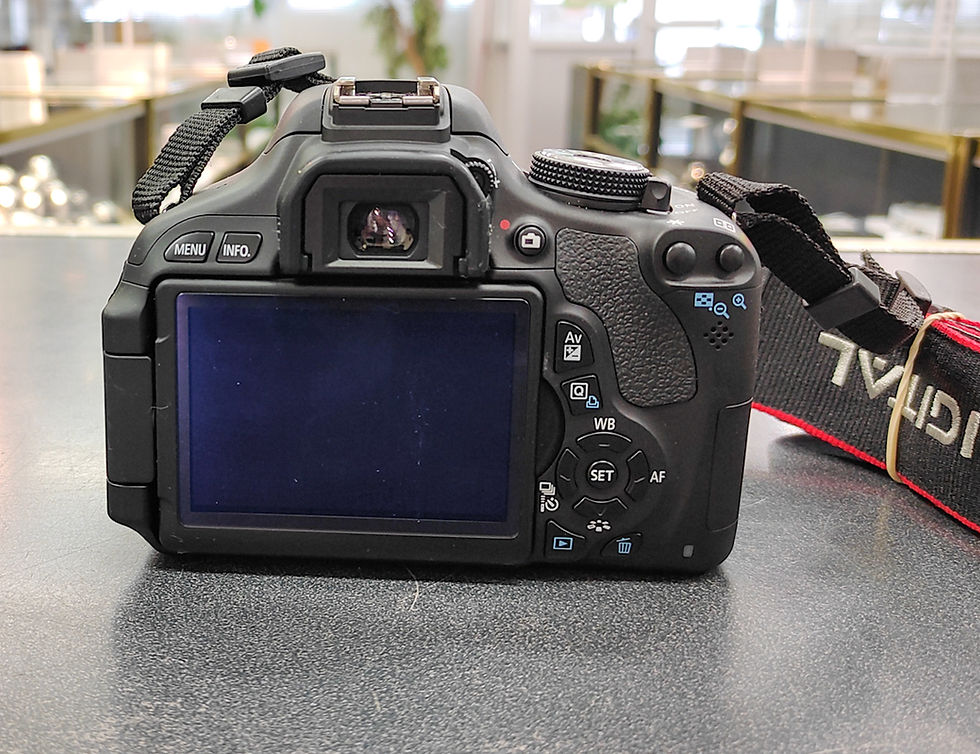 Thumbnail: Canon EOS Rebel T3i / EOS 600D DSLR camera kit with EF-S 18-55mm lens, Canon charger, strap, 64GB memory card