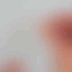 Tying string onto pine cone