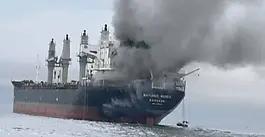 Iran war brings new attacks on commercial ships, Dubai airport, as Tehran warns banks are next