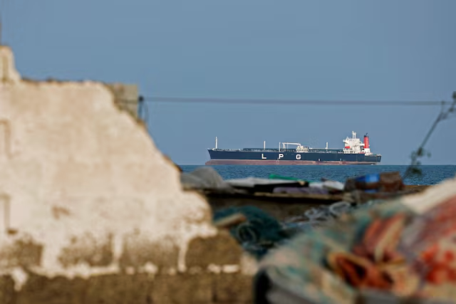 An LPG gas tanker at anchor as traffic is down in the Strait of Hormuz, amid the U.S.-Israeli conflict with Iran, in Shinas, Oman, March 11, 2026. REUTERS/Benoit Tessier Purchase Licensing Rights