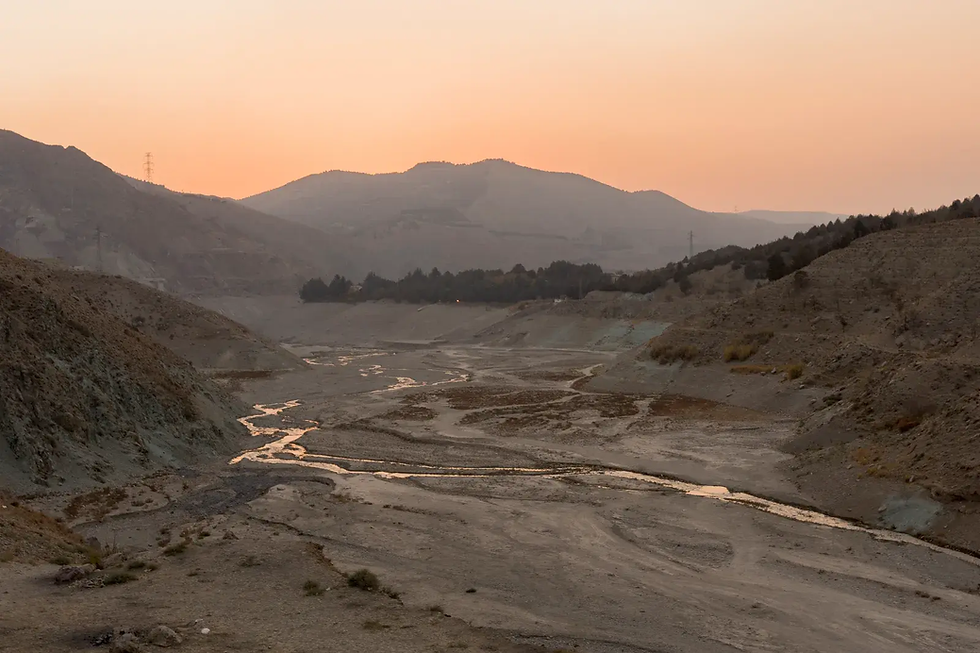 The receding waters of Latyan Dam reveal a dry riverbed near Tehran, Iran, on November 10, 2025. | Bahram/AFP via Getty