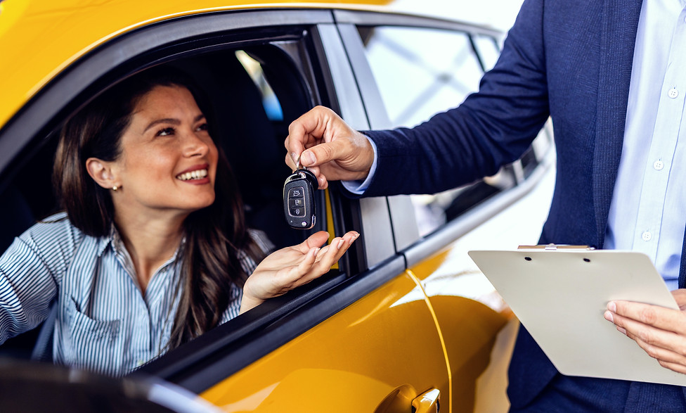 Salesman, woman and purchase a new car a