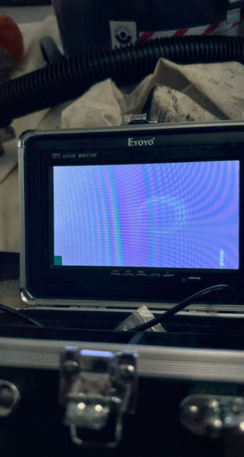 Chimney Sweep Service Liverpool using a screen to monitor the work