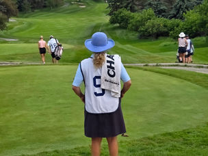Caddy on the first tee
