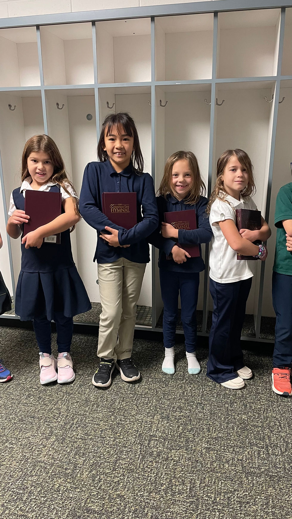 girls with hymnals