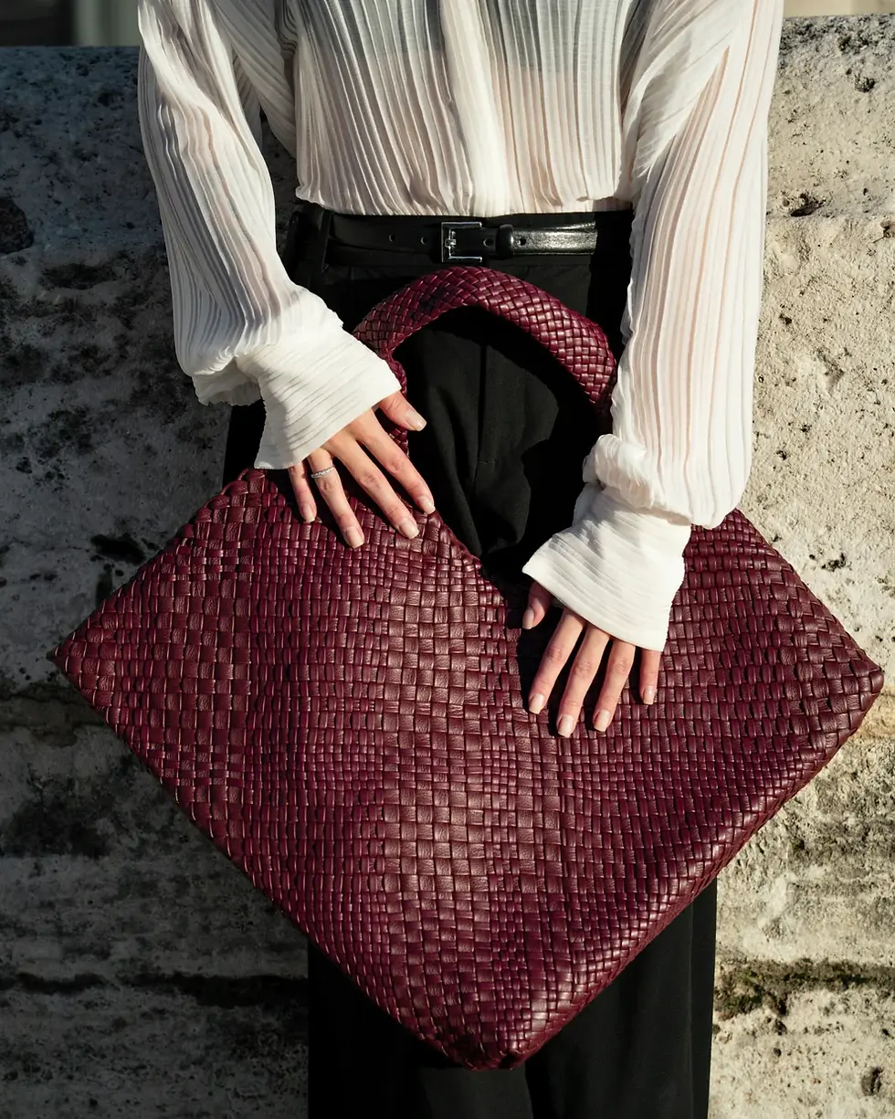 Thumbnail: Lifestyle View Of A Bordeaux Handcrafted Woven Leather Shoulder Bag