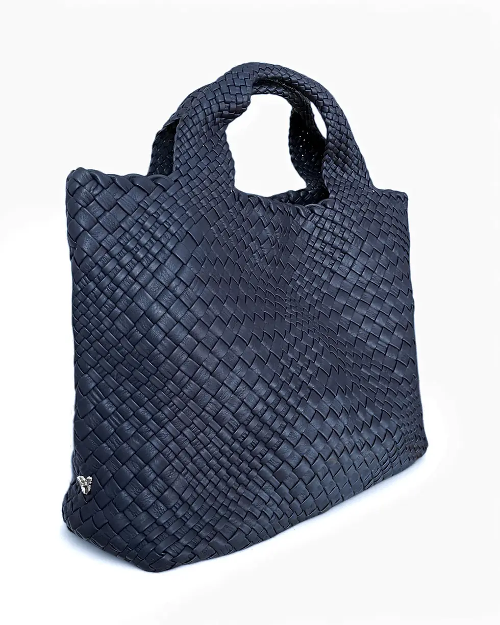 Thumbnail: Side view of a woven navy leather tote bag