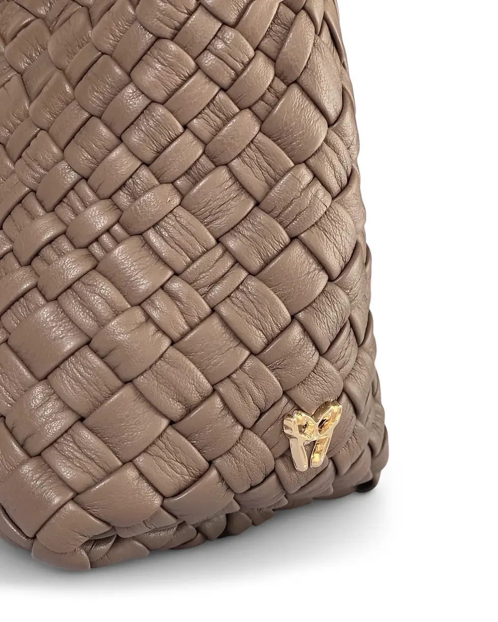 Thumbnail: Detail View Of A Taupe Woven Leather Top Handle Bag