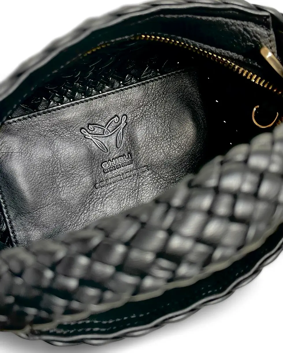 Thumbnail: Interior View Of A Black Woven Leather Top Handle Bag