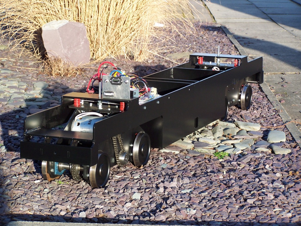 Warship chassis and electrical installation with the body removed.