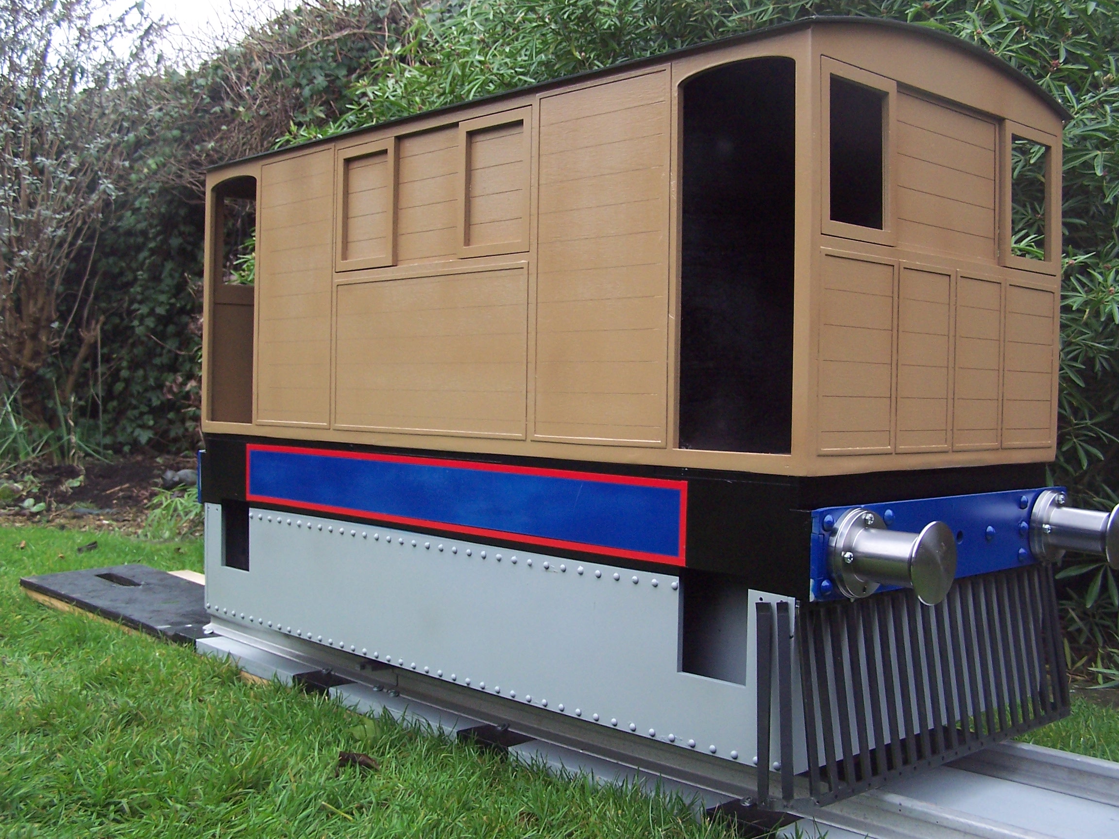 The Y6 timber bodywork outside the workshop.