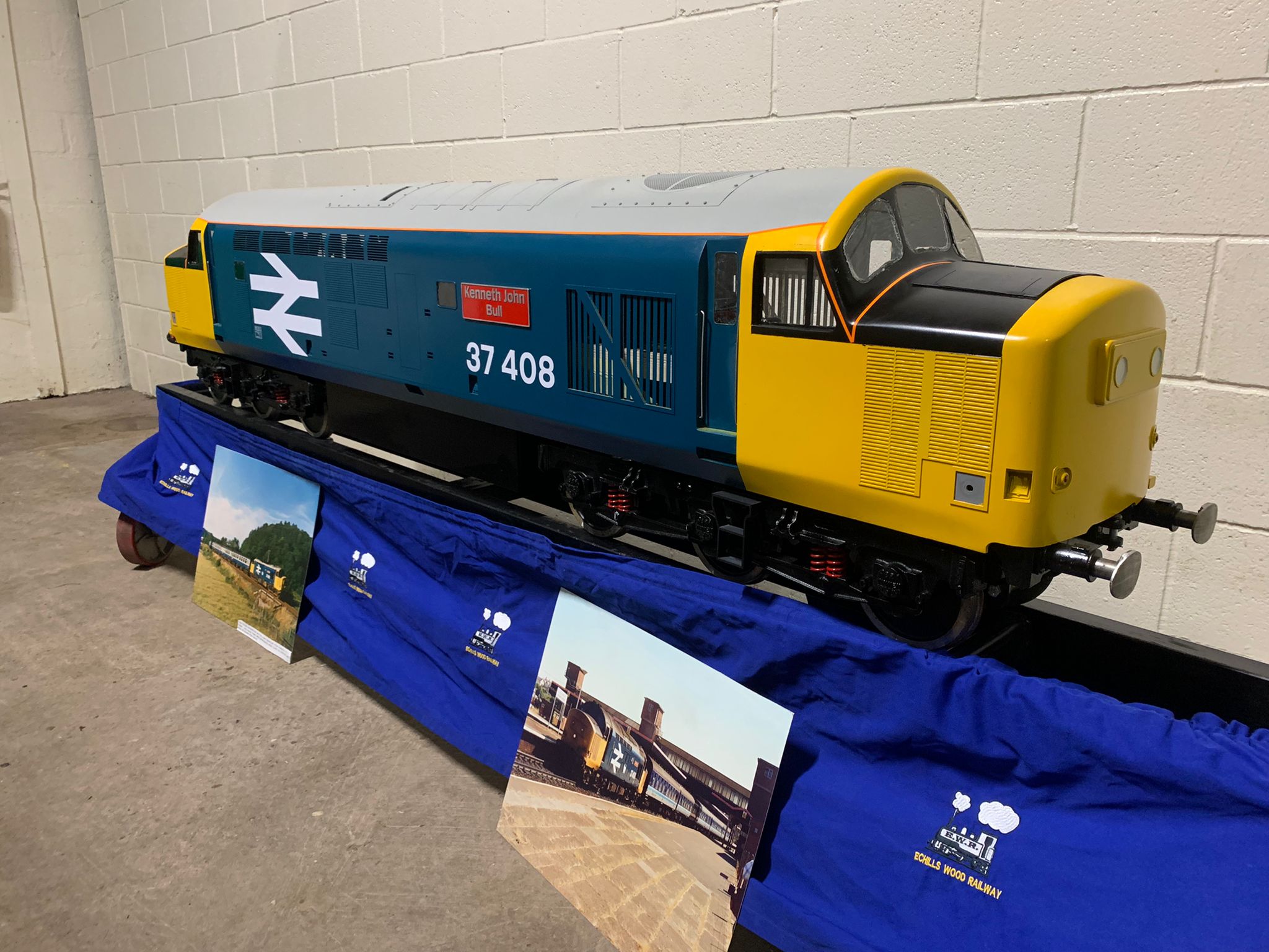 Completed Phoenix Class 37, 37408 “Kenneth John Bull”, in blue and yellow livery.
