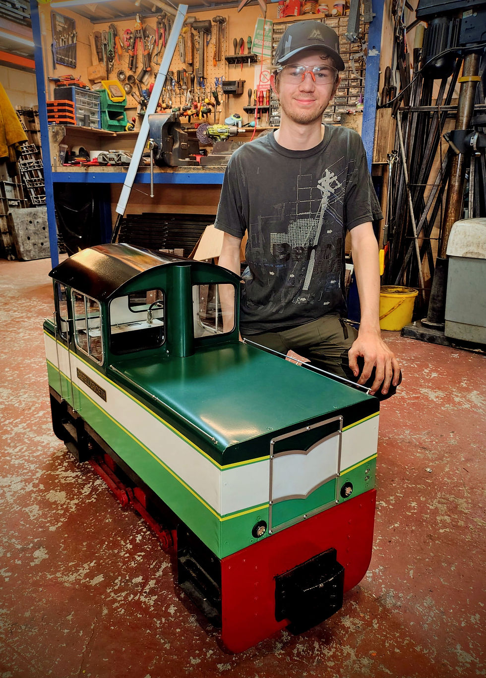 Ryan posing with the loco he spent a considerable amount of time repainting and returning to its former glory