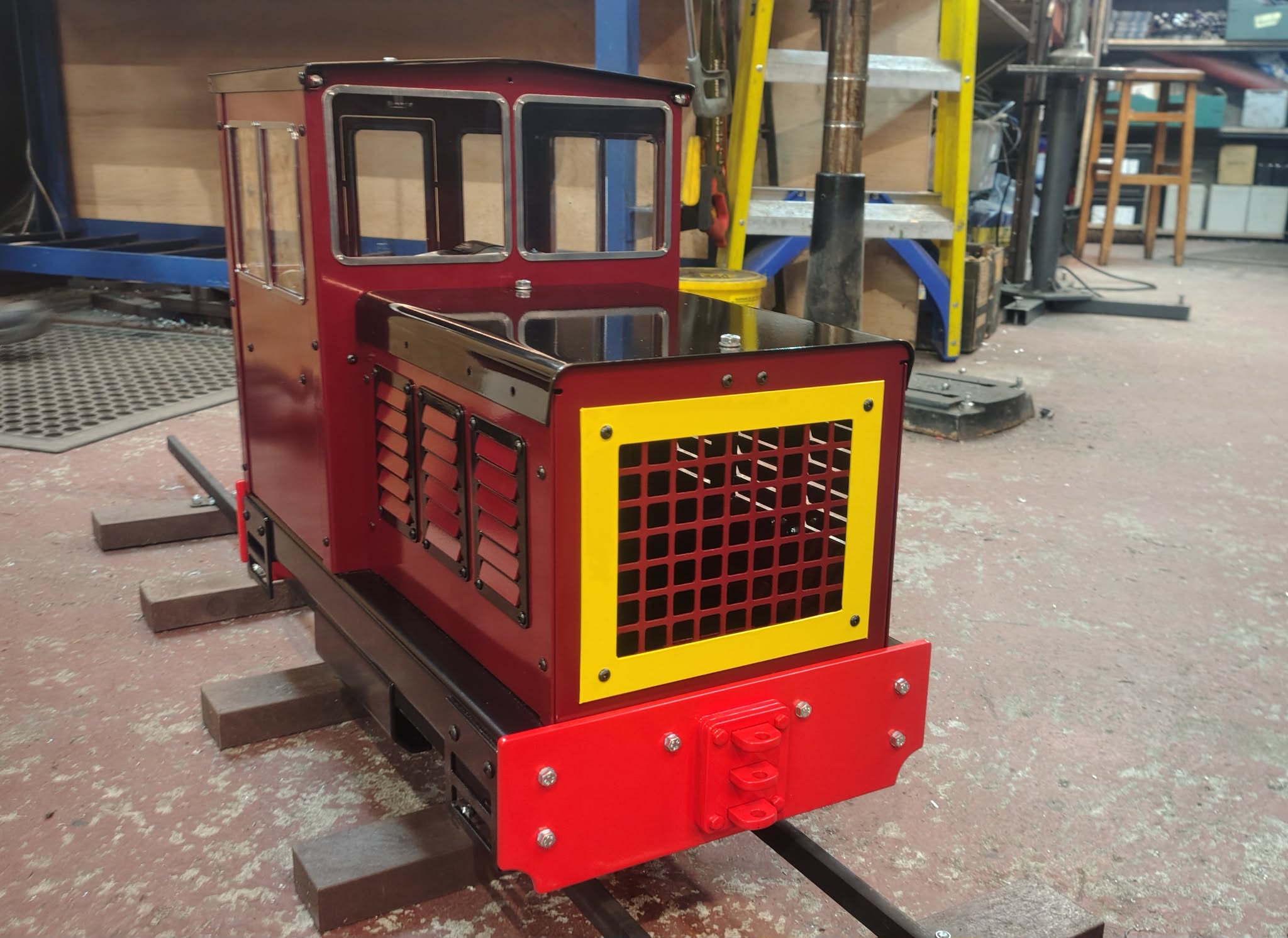 A red Comet 2 in the MRW workshop. Photograph from MRW’s Comet product page.