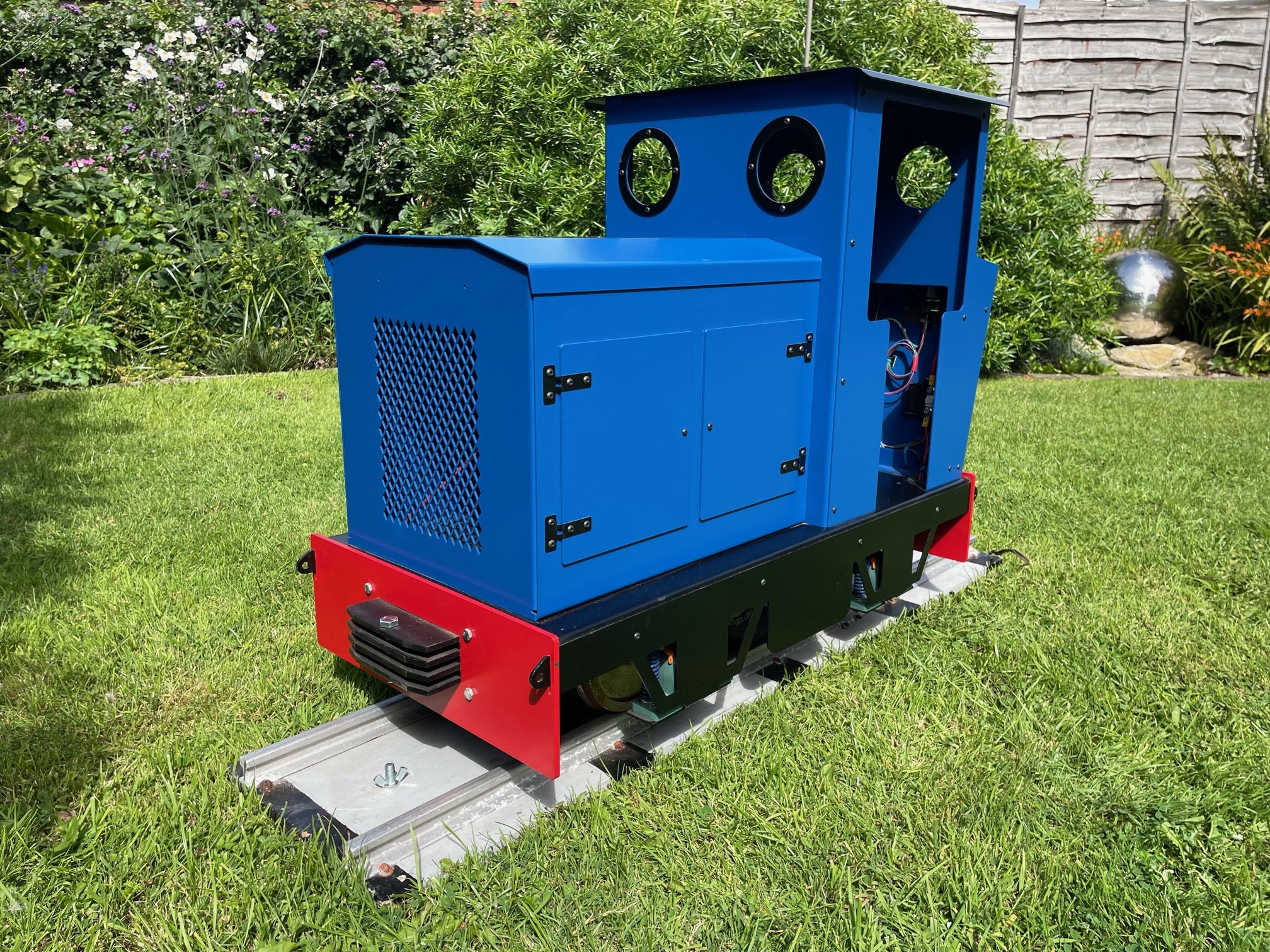 A finished blue Budgie, showing the bonnet, cab and buffer beam.