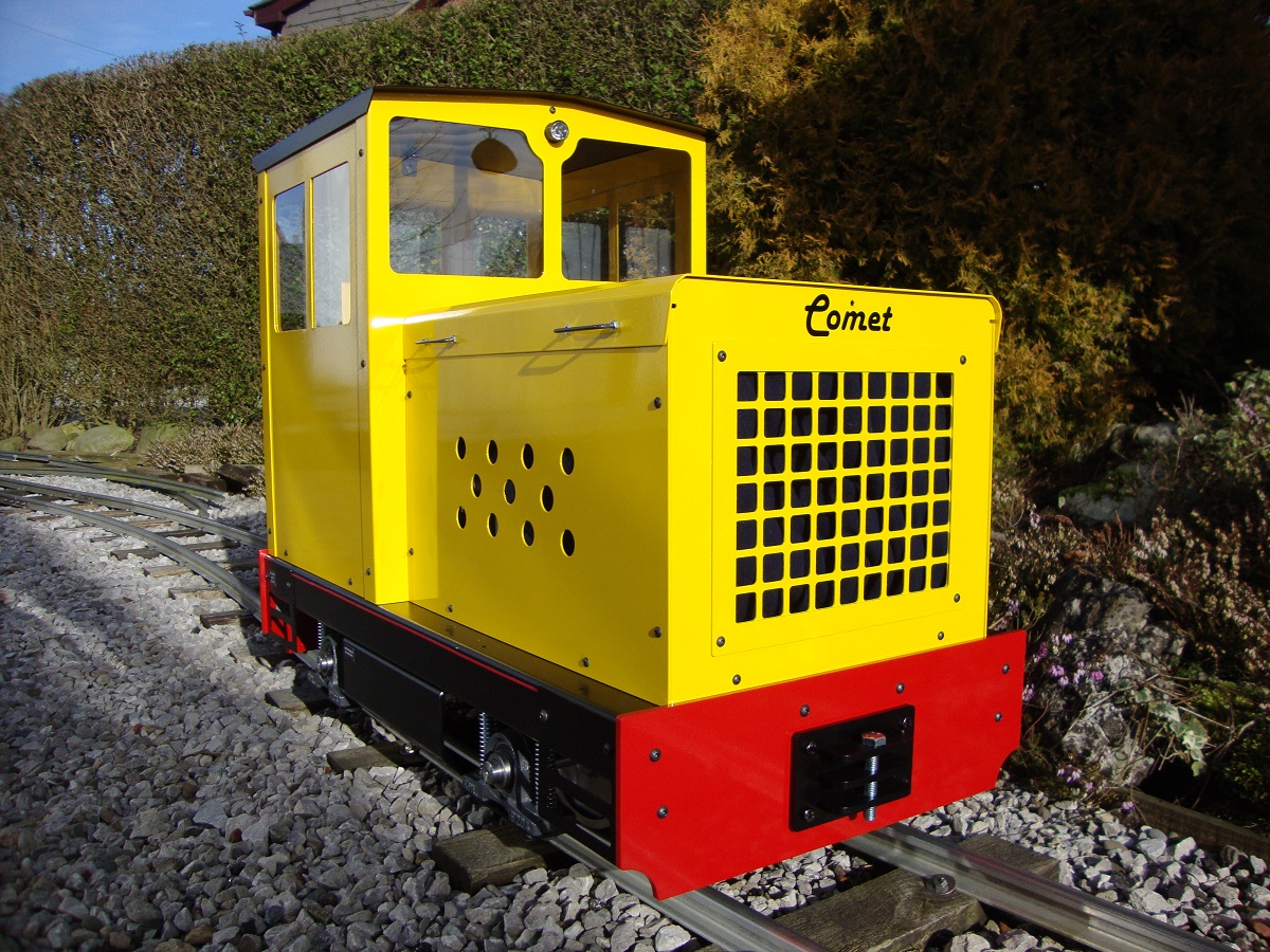A yellow Comet, showing the front grille and buffer beam.